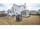 Expansive backyard with playhouse, swing set and sunroom provides plenty of room for outdoor fun and entertainment at 524 Tackett Farms Rd, Smyrna, GA 30082