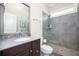Bathroom with a walk-in shower, stylish vanity, and neutral color palette, offering a clean and modern design at 524 Tackett Farms Rd, Smyrna, GA 30082