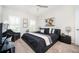 Bedroom features a comfortable bed with dark furnishings and soft carpet at 524 Tackett Farms Rd, Smyrna, GA 30082