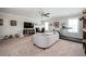 Large bonus room with plush carpeting, ceiling fan, ample seating and exercise equipment at 524 Tackett Farms Rd, Smyrna, GA 30082