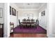 Formal dining room with hardwood floors, modern lighting, and stylish decor at 524 Tackett Farms Rd, Smyrna, GA 30082