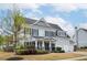 Charming two-story home featuring a welcoming front porch and well-maintained landscaping at 524 Tackett Farms Rd, Smyrna, GA 30082