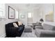 Cozy living room with neutral paint, shuttered windows and comfortable seating, perfect for relaxation and entertaining at 524 Tackett Farms Rd, Smyrna, GA 30082