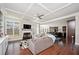 Spacious living room featuring hardwood floors, a fireplace, and ample natural light at 524 Tackett Farms Rd, Smyrna, GA 30082