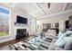 Bright living room with hardwood floors, a fireplace, and large windows at 524 Tackett Farms Rd, Smyrna, GA 30082