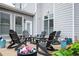 Relaxing backyard patio with seating, plants and flowers is the perfect place to unwind and enjoy the outdoors at 524 Tackett Farms Rd, Smyrna, GA 30082