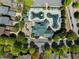 Aerial view of the community pool, playground, and clubhouse area at 9988 Devonshire St, Douglasville, GA 30135