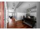 Elegant dining room with hardwood floors, gray walls, and modern table setting at 9988 Devonshire St, Douglasville, GA 30135