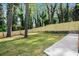 A spacious, newly fenced-in backyard offering privacy and room to roam at 1555 Olympian Sw Way, Atlanta, GA 30310