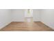 Finished basement with LVP flooring, white trim and a view into another room at 1555 Olympian Sw Way, Atlanta, GA 30310