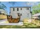 Back exterior featuring a deck with stairs and a fenced-in backyard at 1555 Olympian Sw Way, Atlanta, GA 30310