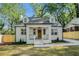 Charming home featuring a front porch, well-manicured lawn, and a cozy curb appeal at 1555 Olympian Sw Way, Atlanta, GA 30310