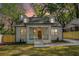 Charming home featuring a front porch, well-manicured lawn, and a cozy curb appeal at 1555 Olympian Sw Way, Atlanta, GA 30310