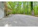 Large driveway and parking area behind home perfect for RV or boat parking at 2633 Jonesboro Rd, Fairburn, GA 30213
