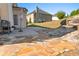 An outdoor patio with flagstone and a grill at 3971 Busby Mill Ct, Ellenwood, GA 30294