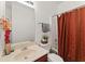 Neutral bathroom with a shower-tub combination, vanity, and decorative accents at 3971 Busby Mill Ct, Ellenwood, GA 30294