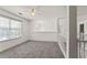 Upstairs bonus room with a large window and open view, perfect for relaxing at 3971 Busby Mill Ct, Ellenwood, GA 30294