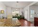 Bright breakfast nook featuring hardwood floors and natural light, great for casual dining at 3971 Busby Mill Ct, Ellenwood, GA 30294