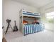 Comfortable bedroom with a twin bunk bed and natural light at 4496 Sardis Church Rd, Buford, GA 30519