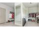 Spacious closet with ample storage, shelving, and full-length mirror at 4496 Sardis Church Rd, Buford, GA 30519