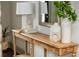 Console table with decor at 4496 Sardis Church Rd, Buford, GA 30519