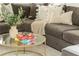 Cozy living room showcasing stylish decor, a glass coffee table, and plush seating for relaxing at 4496 Sardis Church Rd, Buford, GA 30519