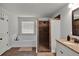 Modern bathroom featuring a walk-in shower, soaking tub, and granite vanity at 524 Trousseau Ln, Mcdonough, GA 30252