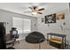 A bedroom area features a cozy beanbag chair, desk and pirate themed decor at 524 Trousseau Ln, Mcdonough, GA 30252