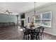 Cozy dining area adjacent to the living room and kitchen, with ample natural light at 524 Trousseau Ln, Mcdonough, GA 30252