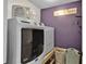 Functional laundry area with modern washer and dryer and custom signage at 524 Trousseau Ln, Mcdonough, GA 30252