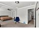 Open main bedroom with ceiling fan and sitting area at 524 Trousseau Ln, Mcdonough, GA 30252