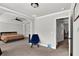 Large primary bedroom features trey ceiling, carpet flooring, and a seating area at 524 Trousseau Ln, Mcdonough, GA 30252