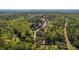 Scenic aerial view of the neighborhood surrounded by lush green trees and nature at 550 Vinings Springs Se Dr, Mableton, GA 30126