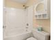 Clean bathroom features a shower-tub combo and a white vanity at 550 Vinings Springs Se Dr, Mableton, GA 30126