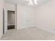 Neutral bedroom features carpeting, white trim, and a pair of double closets at 550 Vinings Springs Se Dr, Mableton, GA 30126
