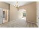 Bedroom featuring carpet, a chandelier, and lots of natural light at 550 Vinings Springs Se Dr, Mableton, GA 30126
