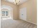 Bright bedroom features carpet, crown molding, and natural light at 550 Vinings Springs Se Dr, Mableton, GA 30126