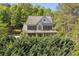 Charming two-story home with a well-manicured front yard and inviting curb appeal at 550 Vinings Springs Se Dr, Mableton, GA 30126