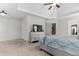 Main bedroom with tray ceiling and neutral walls showcasing plenty of space and natural light at 6062 Fielder Way, Douglasville, GA 30135
