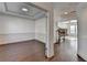 Elegant dining area featuring hardwood floors, open to the stairway and living space at 2272 Misty Brook Ct, Buford, GA 30519