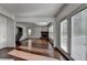 Spacious living room features a stone fireplace, hardwood floors, and lots of natural light at 2272 Misty Brook Ct, Buford, GA 30519