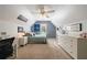 Upstairs bedroom features vaulted ceilings, neutral carpet and plenty of natural light at 415 Oak Laurel Ct, Johns Creek, GA 30022