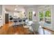 Breakfast nook features wood floors, lots of natural light, and deck access at 415 Oak Laurel Ct, Johns Creek, GA 30022