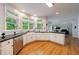 Stylish kitchen with granite countertops, stainless steel appliances, and bay windows at 415 Oak Laurel Ct, Johns Creek, GA 30022