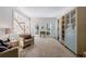 Cozy living room with plush seating and custom built-ins at 415 Oak Laurel Ct, Johns Creek, GA 30022