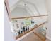 Bright living room with large windows and vaulted ceilings, viewed from the staircase at 415 Oak Laurel Ct, Johns Creek, GA 30022