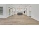 Living room provides expansive space with kitchen access at 6680 Benchwood Path, Cumming, GA 30028
