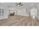 Spacious living area offering open floorplan and seamless transition to kitchen at 6680 Benchwood Path, Cumming, GA 30028