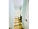 This bathroom features wood flooring, a white bathtub, and granite countertop at 7675 Lanier View Rdg, Cumming, GA 30041