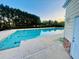 Community pool with lane markers, lounge chairs, and a utility building at 7675 Lanier View Rdg, Cumming, GA 30041